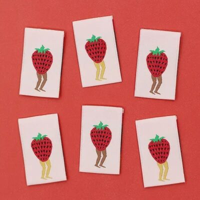 Strawberry legs on pink background labels made and designed in Melbourne Australia