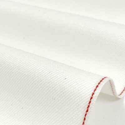 Heavyweight pure cotton Japanese denim in cream white with red selvage detail